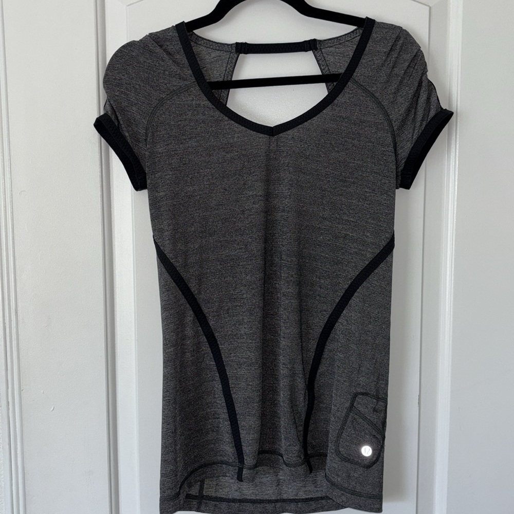 Lululemon open back reflective ruffle pocket top shirt 6